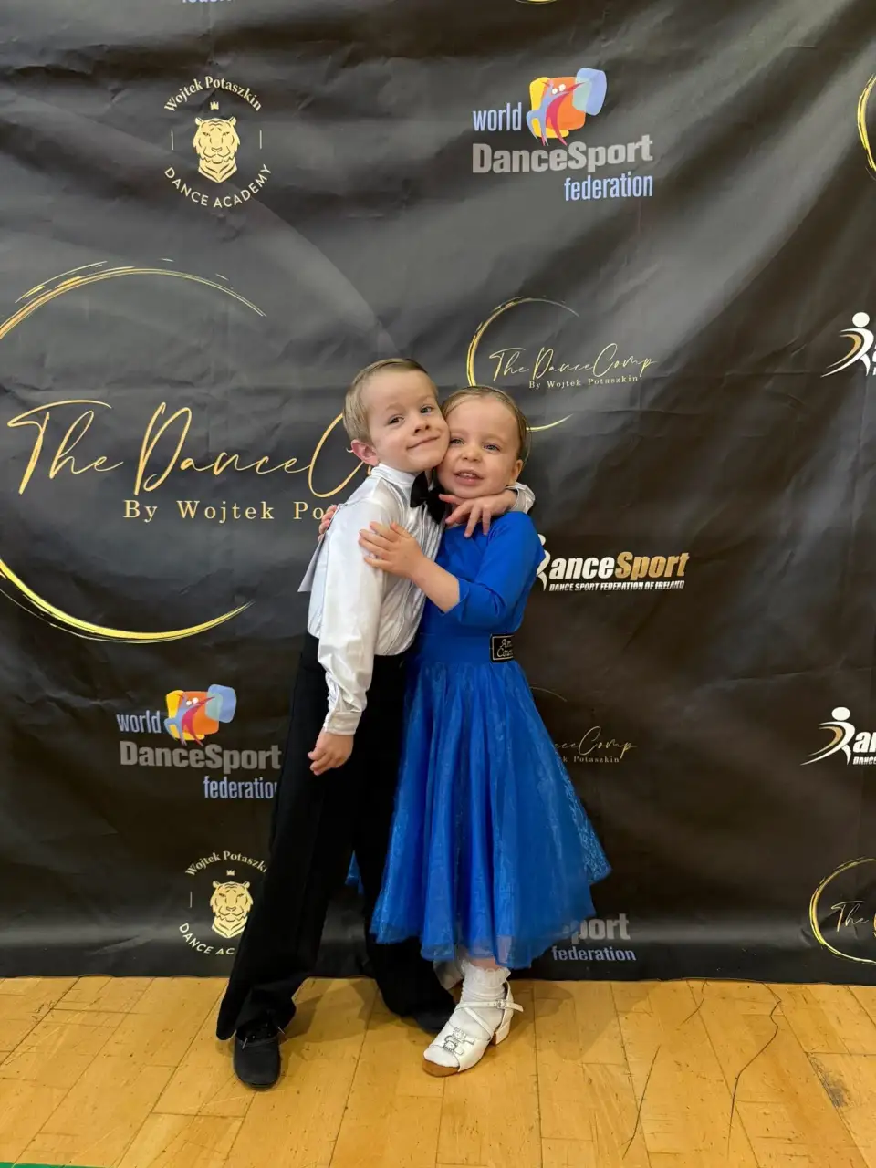 Young dancers celebrating after a performance